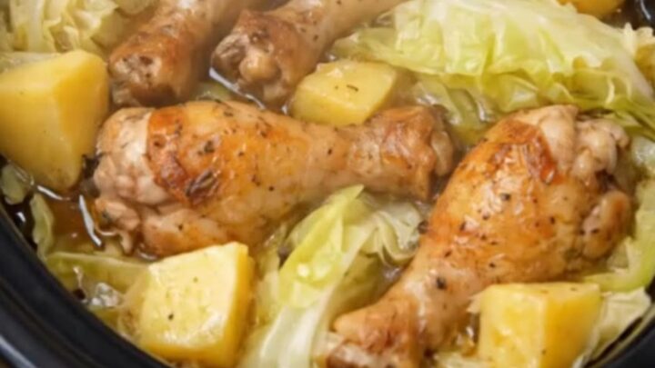 Slow cooker chicken drumsticks served over a bed of tender cabbage wedges and baby yellow potatoes.