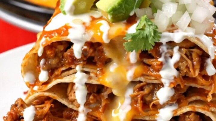 A tall, beautiful wedge of Pork Al Pastor Taco Lasagna showing distinct layers of pork, pineapple, and melted cheese.