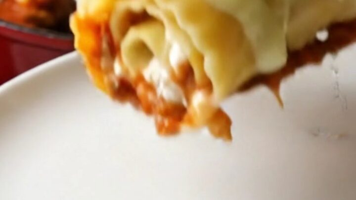 Skillet lasagna roll-ups with melted mozzarella and basil