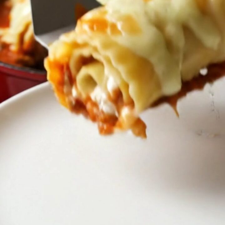 Skillet lasagna roll-ups with melted mozzarella and basil