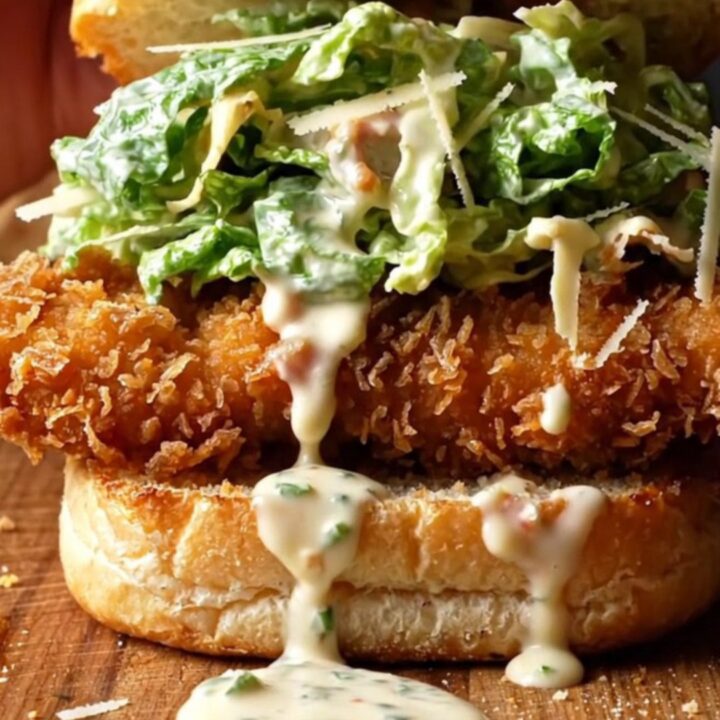 Crispy chicken Caesar sandwich on buttered brioche, with golden panko crust and creamy romaine slaw.