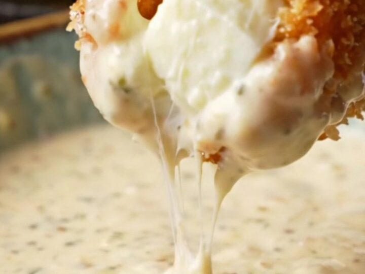 Golden crispy potato croquettes with a cheesy pull, served with ranch dip