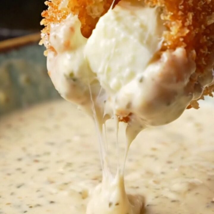 Golden crispy potato croquettes with a cheesy pull, served with ranch dip