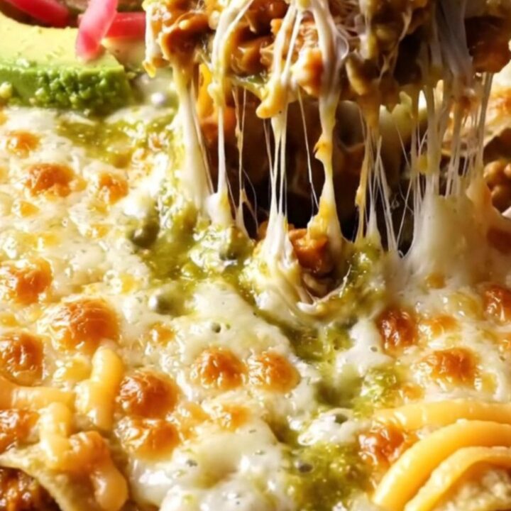 One-pan green chile chicken enchilada skillet with blistered Monterey Jack, avocado