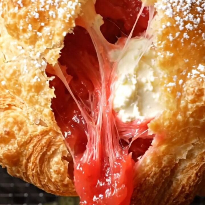 Golden blistered guava and cream cheese tortilla pastelito broken open