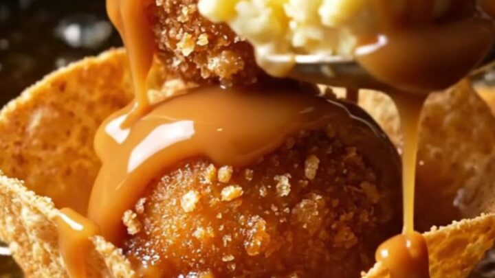 Churro-crusted fried ice cream ball in a crispy cinnamon tortilla bowl with hot fudge, caramel and whipped cream