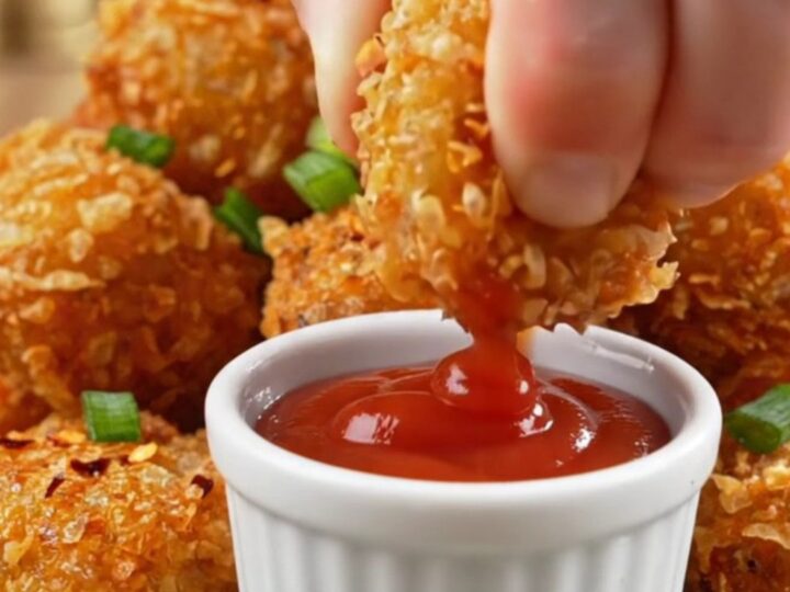 Golden crispy potato nuggets with a shatteringly crunchy crust, served with ketchup