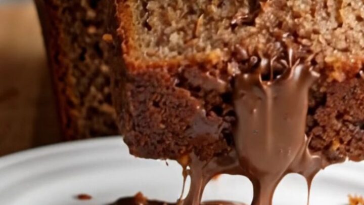 Sliced ultra-moist chocolate chip banana bread showing tender crumb and melted chocolate