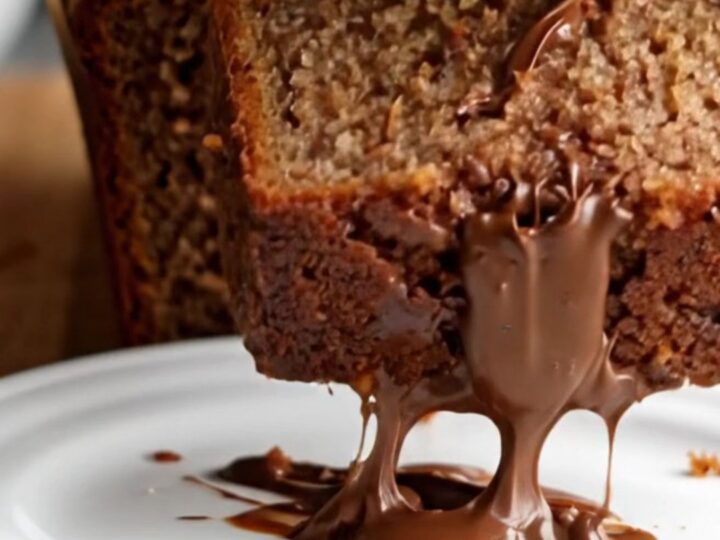 Sliced ultra-moist chocolate chip banana bread showing tender crumb and melted chocolate