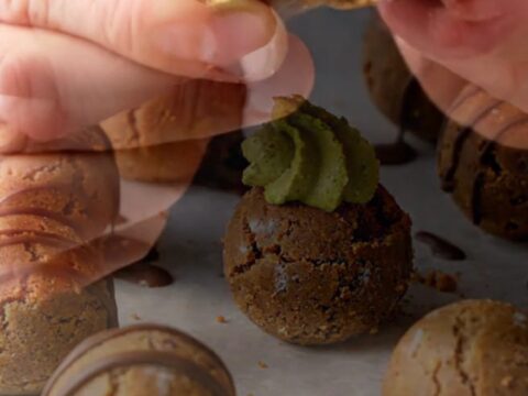 Decadent no-bake biscuit cookies with pistachio cream center and chocolate drizzle