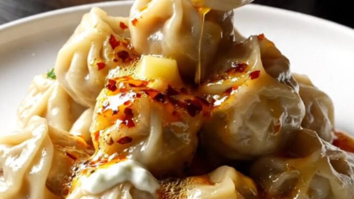Plated mini meatballs with garlic yogurt and chili butter