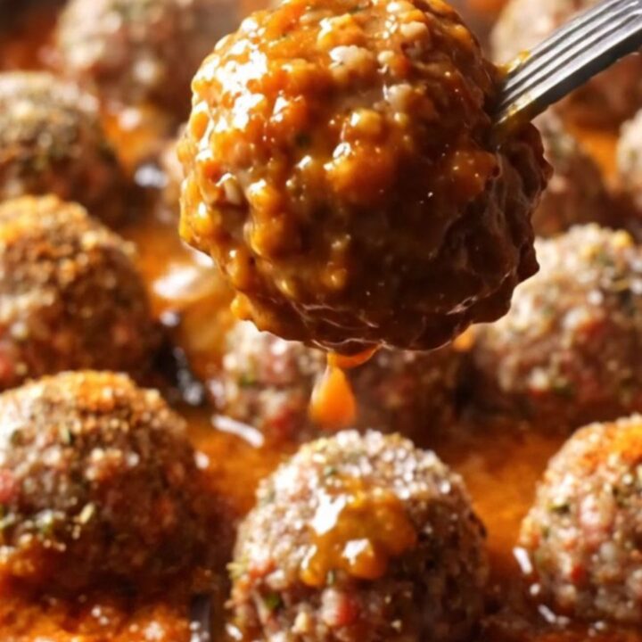 One-pan Turkish eggplant and meatball skillet with glossy meatballs in thick tomato gravy