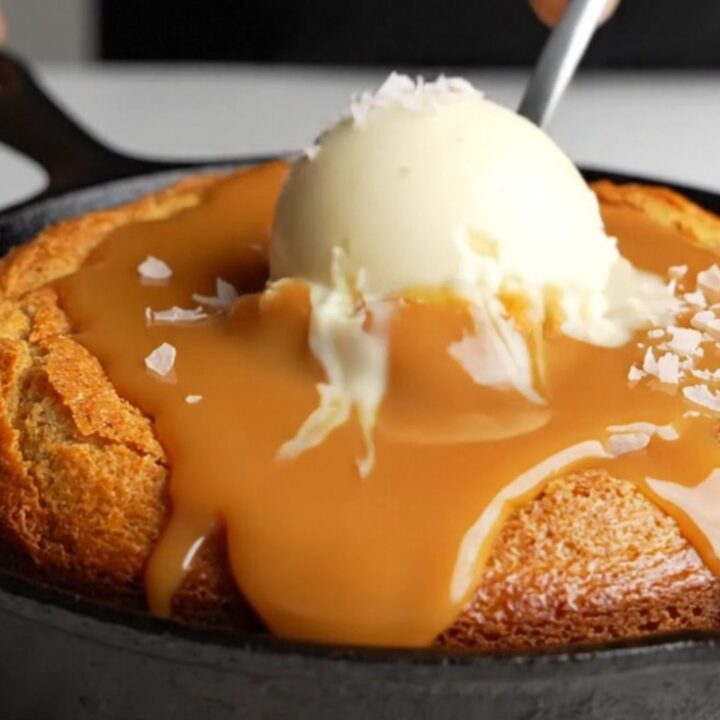 Molten dulce de leche skillet lava cake with ice cream and sea salt