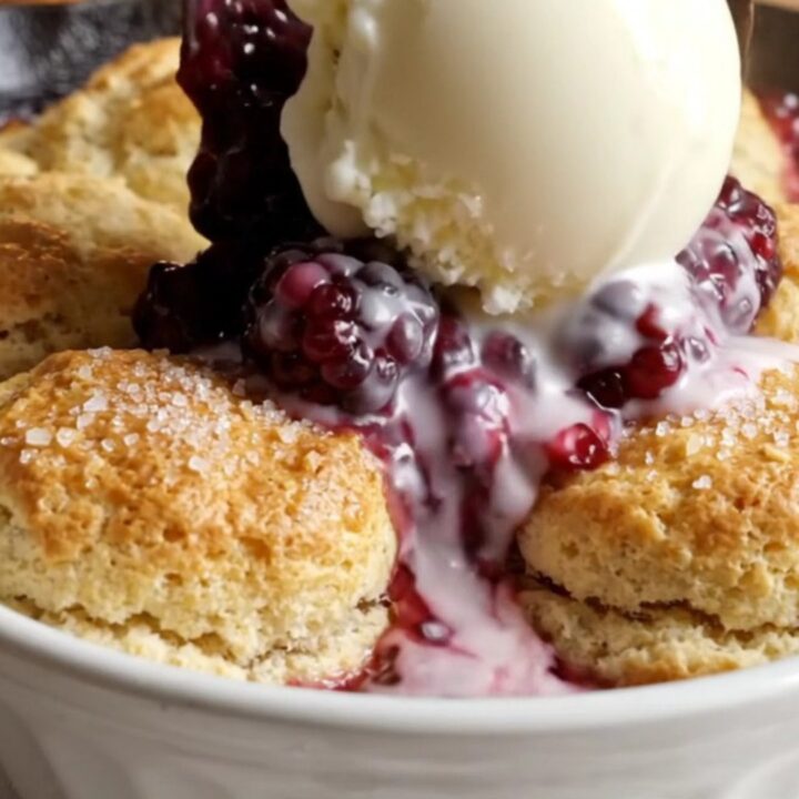 Skillet cobbler with golden biscuits and bubbling berry filling