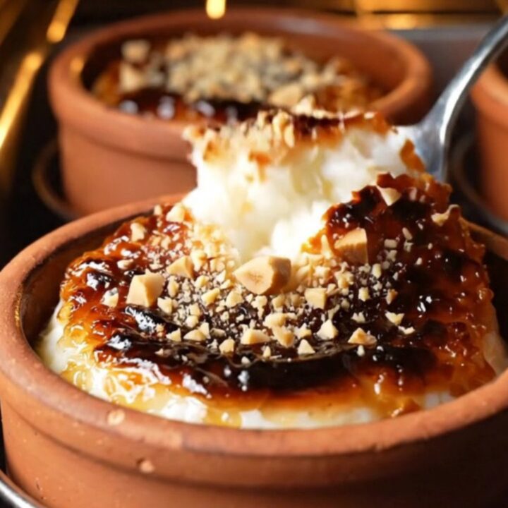 Caramelized top of Turkish rice pudding with cracks and hazelnuts