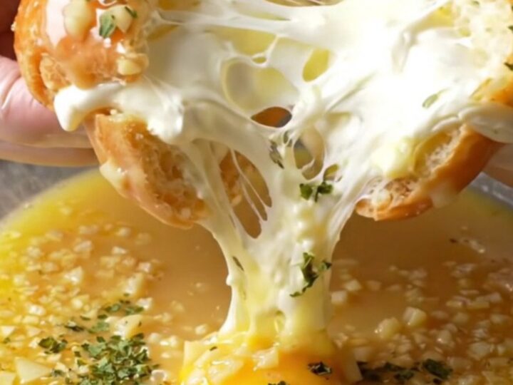 Golden toasted garlic bread buns with creamy filling oozing out