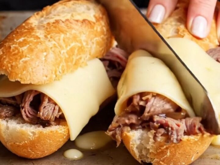 French dip baguette with roast beef, provolone, and au jus