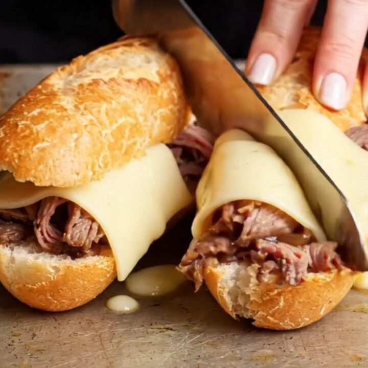 French dip baguette with roast beef, provolone, and au jus
