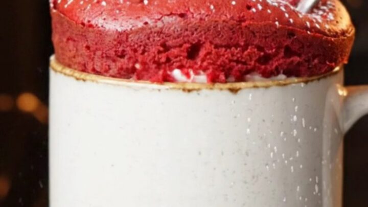 Red velvet mug cake with molten cream cheese center flowing out