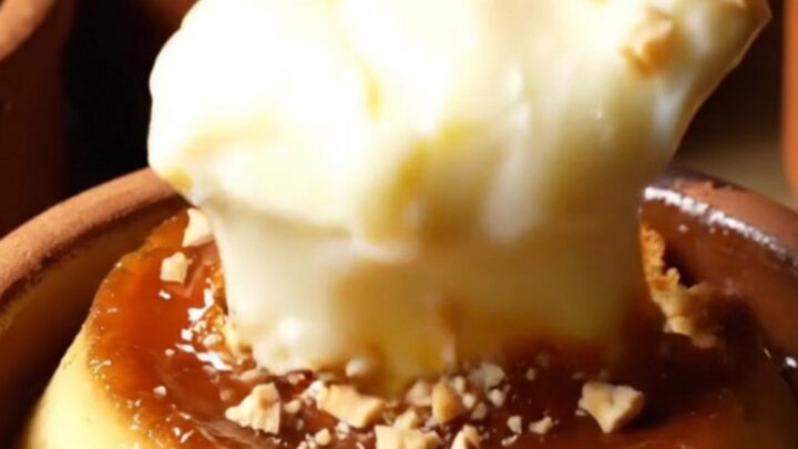 Caramelized baked milk pudding with blistered golden top and hazelnuts