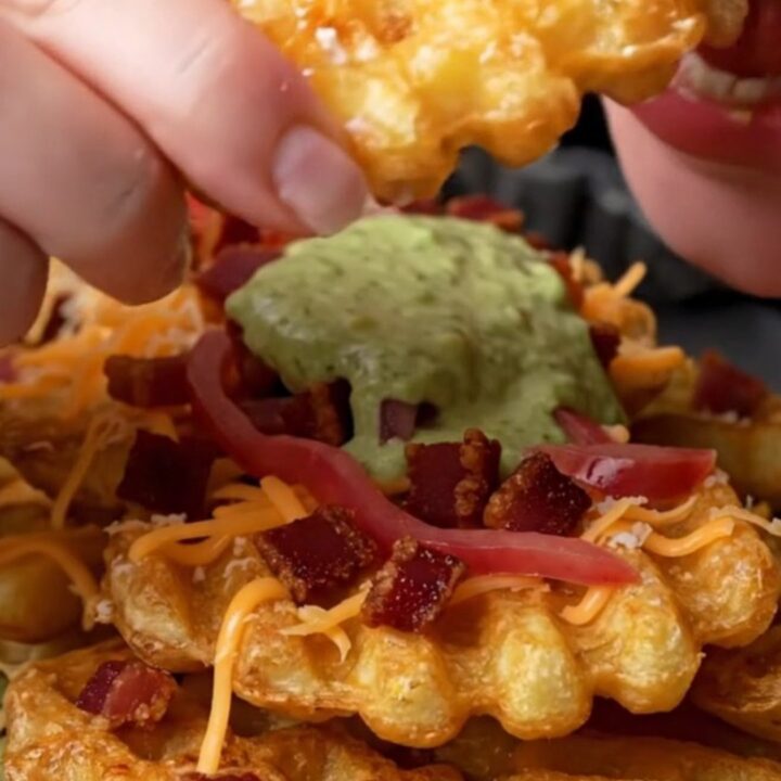 Loaded waffle fries with melted cheese, bacon, jalapeño-lime crema, and pickled red onions