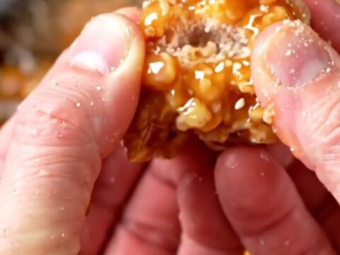 Crispy Korean honey butter popcorn chicken with sesame seeds in a glossy glaze