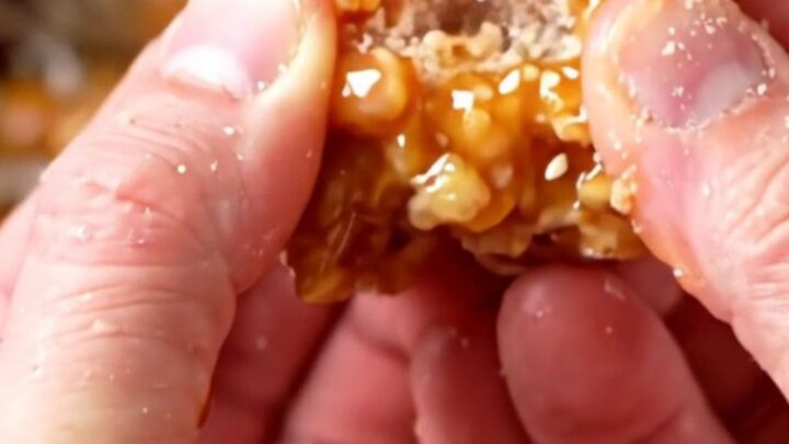 Crispy Korean honey butter popcorn chicken with sesame seeds in a glossy glaze