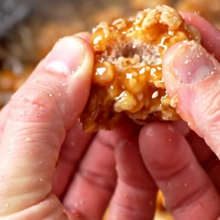 Crispy Korean honey butter popcorn chicken with sesame seeds in a glossy glaze