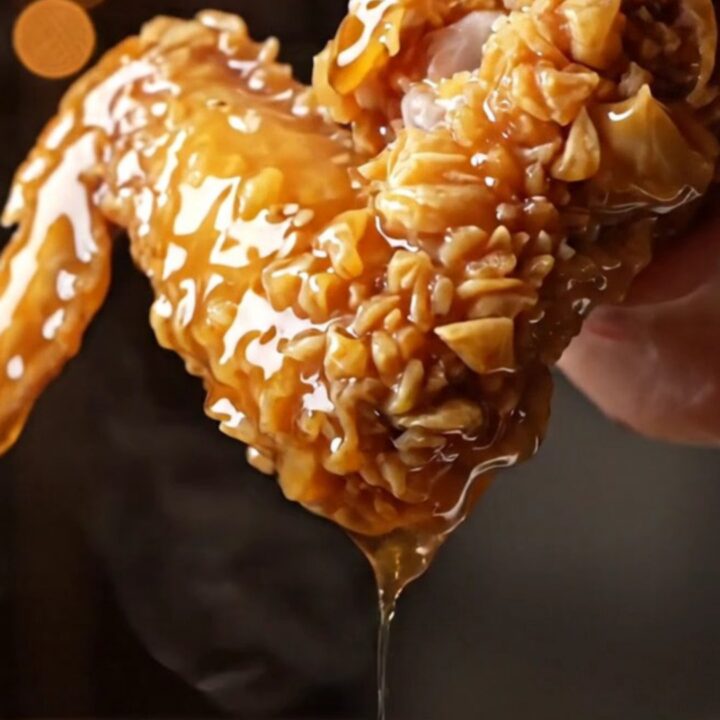 Crispy Korean honey garlic fried chicken wings piled high on a platter