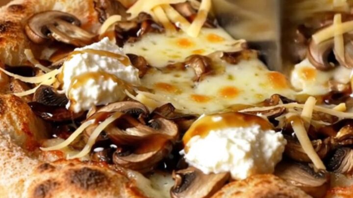 Golden sourdough flatbread topped with melted fontina, sautéed wild mushrooms, ricotta dollops