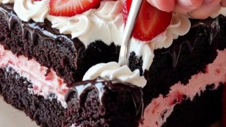A full multi-layer strawberry Ding Dong sheet cake with chocolate ganache and strawberry rosettes.