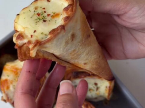 Crispy golden tortilla cones filled with seasoned beef and melted cheese
