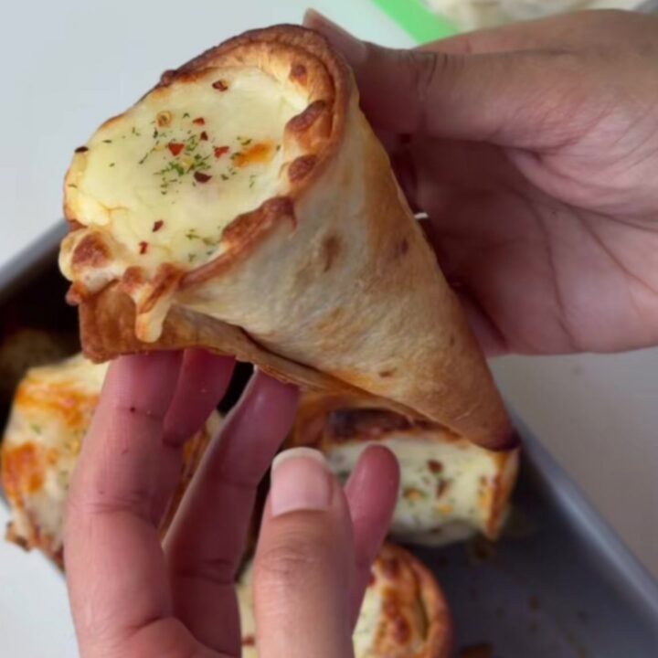 Crispy golden tortilla cones filled with seasoned beef and melted cheese
