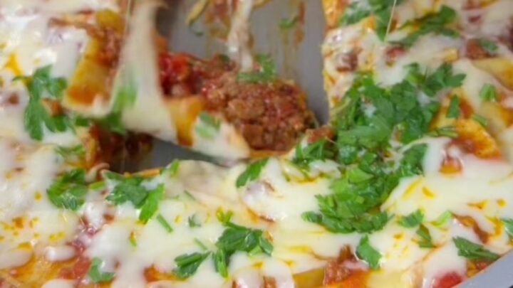 Skillet lasagna roll-ups with melted mozzarella and basil