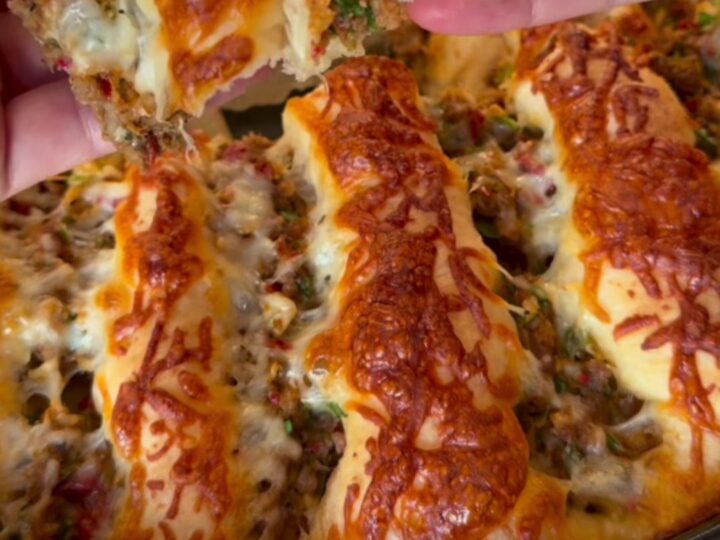 Blistered Turkish lahmacun pide with spiced beef, lemon wedges, and parsley