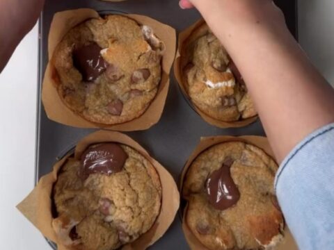 Warm s'mores cookie cups with toasted marshmallow and chocolate