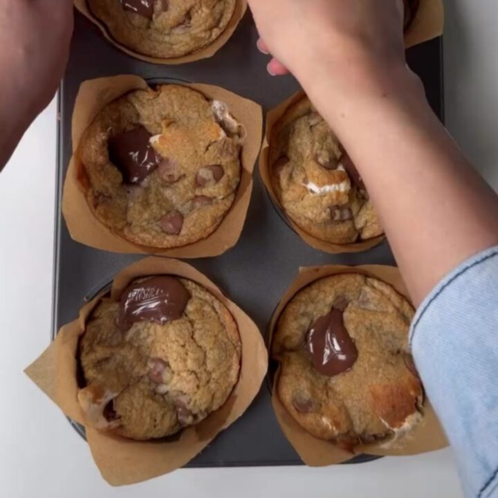 Warm s'mores cookie cups with toasted marshmallow and chocolate