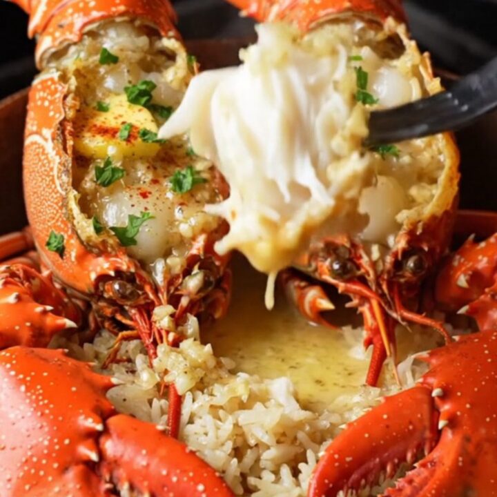 Broiled lobster tails with garlic cream sauce over jasmine rice