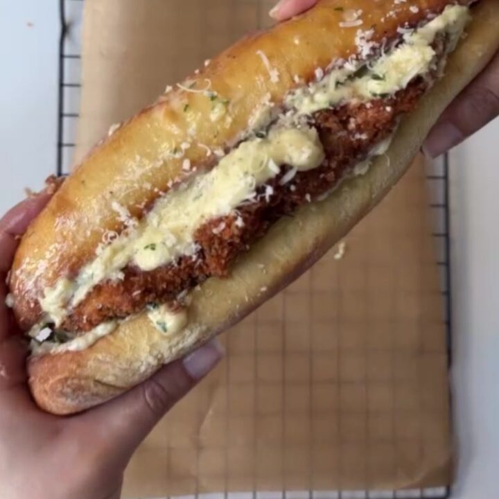 Crispy chicken Alfredo sandwich on toasted garlic ciabatta with melted provolone