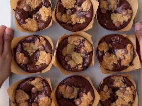 Golden brown brookie cups with gooey chocolate center and flaky sea salt on top