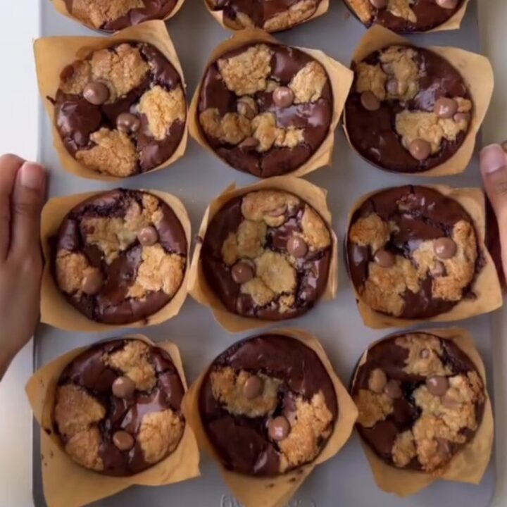 Golden brown brookie cups with gooey chocolate center and flaky sea salt on top