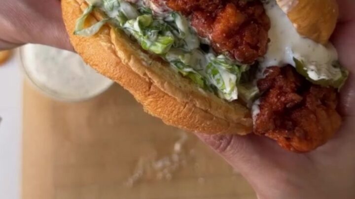 Crispy Nashville hot chicken sandwich on toasted brioche with coleslaw and pickles