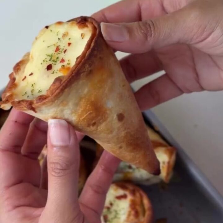 Crispy golden tortilla cones filled with seasoned ground beef and melted mozzarella