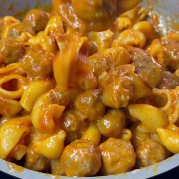 One-pan mini meatball and shell pasta with melted mozzarella cheese pull