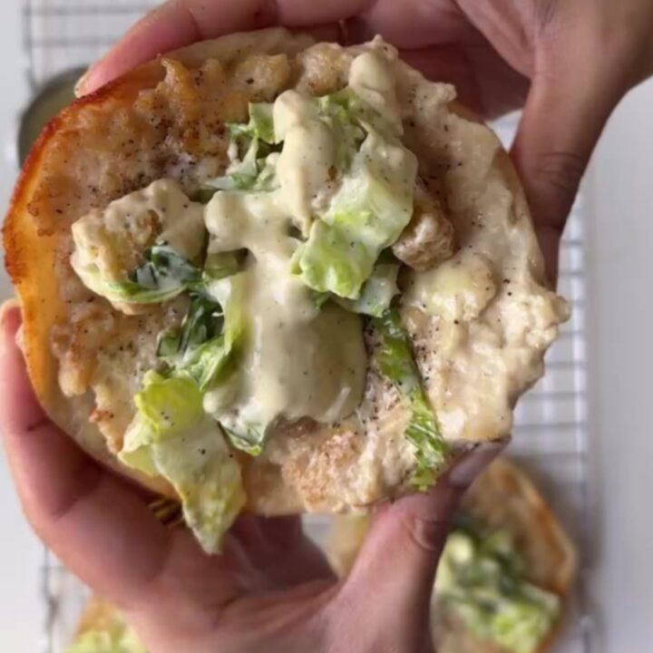 Crispy chicken taco topped with romaine, parmesan, and Caesar dressing