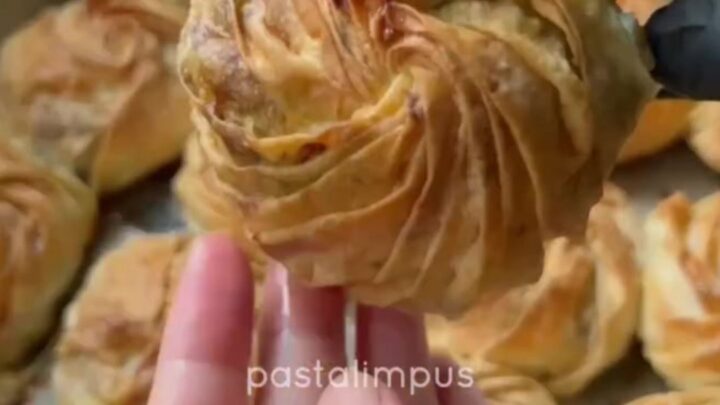 Golden rose börek with spinach and feta, crispy phyllo layers.