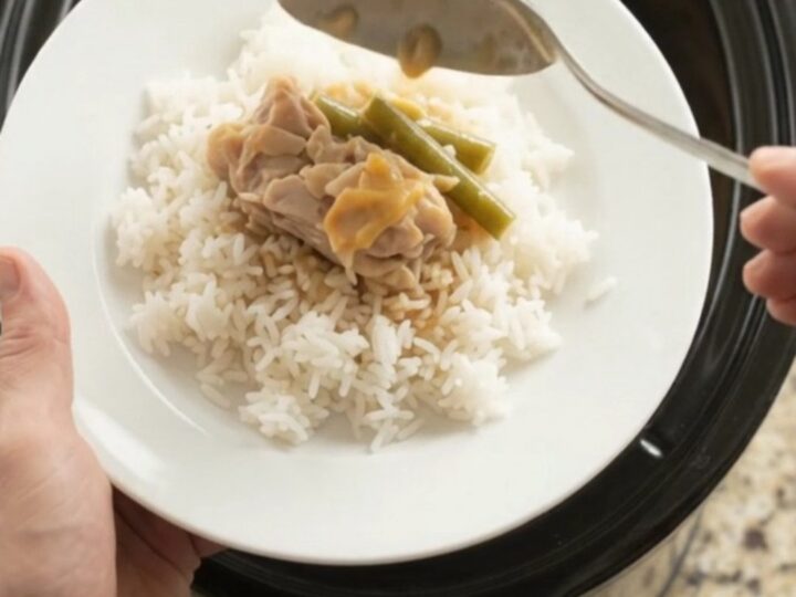 Slow cooker chicken thighs with green beans in a creamy cheddar sauce