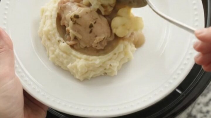 Slow cooker chicken thighs and cauliflower in a creamy Swiss cheese sauce
