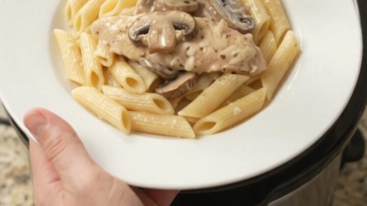 Slow cooker chicken tenders with mushrooms and mozzarella in a creamy sauce.