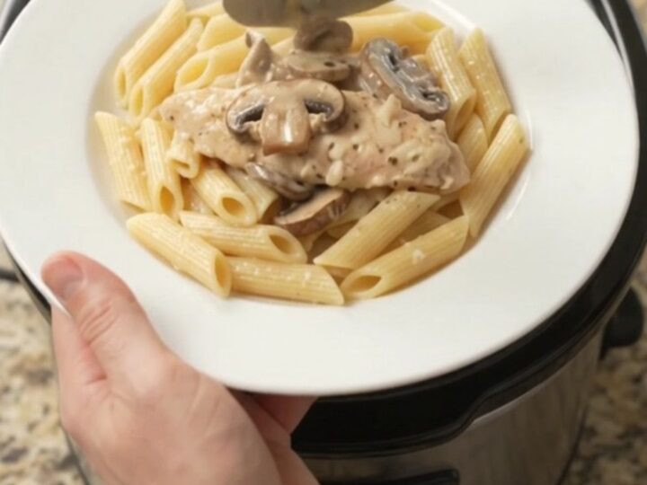 Slow cooker chicken tenders with mushrooms and mozzarella in a creamy sauce.